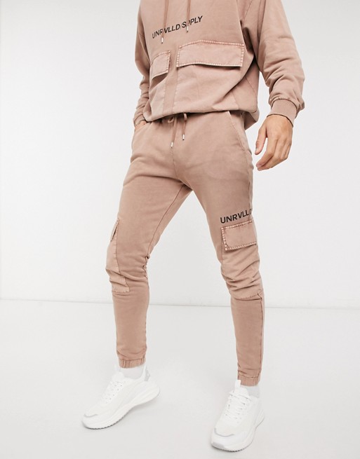 ASOS Unrvlld Supply co-ord oversized joggers in washed tan with printed logo