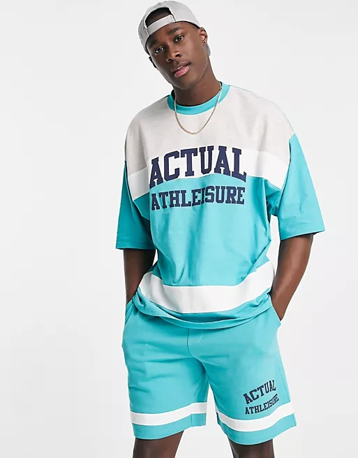 ASOS Actual Athleisure co-ord with splicing detail in teal + ASOS Actual Athleisure co-ord oversized t-shirt with splicing detail in green